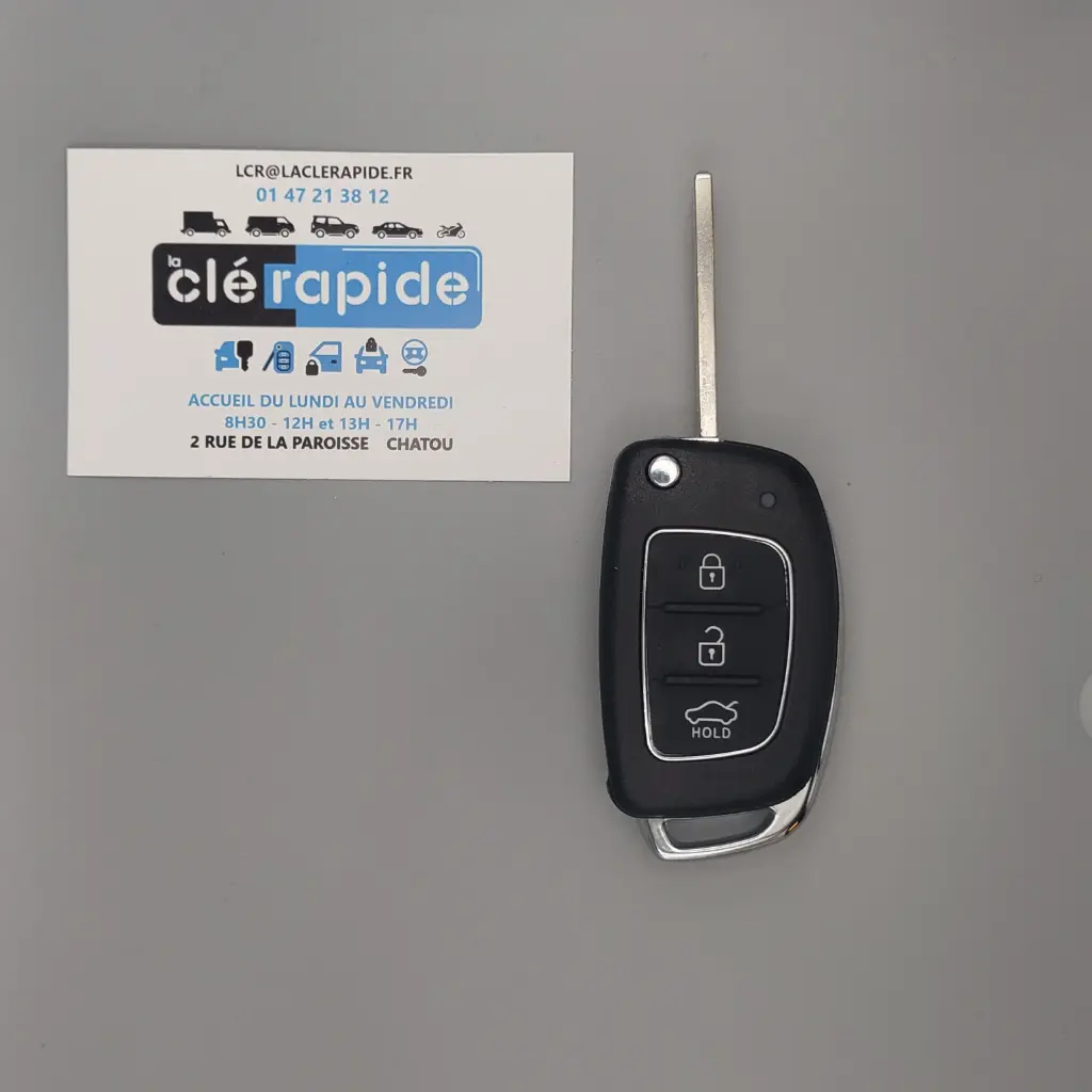 TELECOMMANDE PLIANTE SANTE FE 2012-2015 3 BOUTONS ID60 Mise au code et taillage inclus, à partir du code de clé ou d'une photo de la clé du véhicule